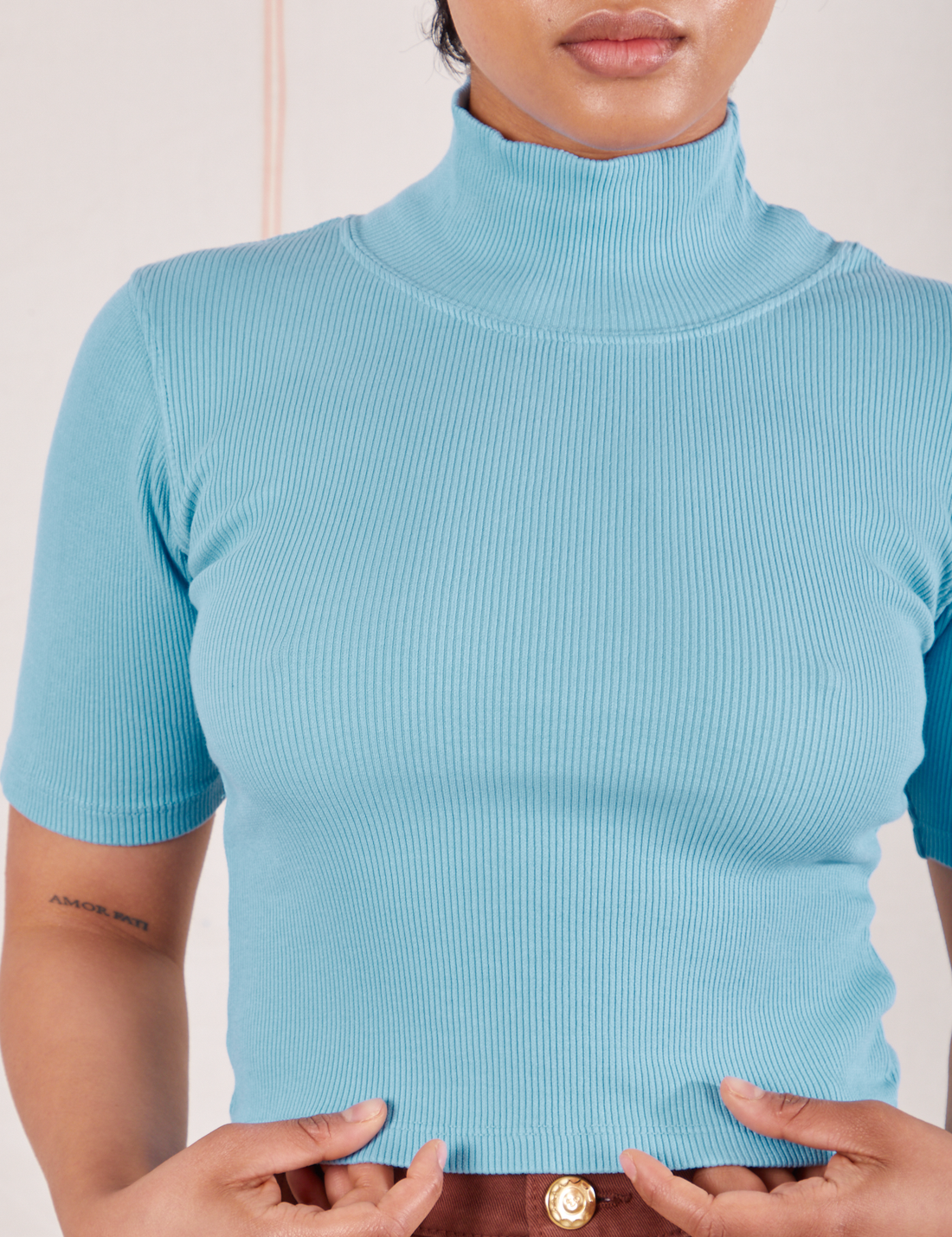 1/2 Sleeve Essential Turtleneck in Baby Blue front close up on Mika