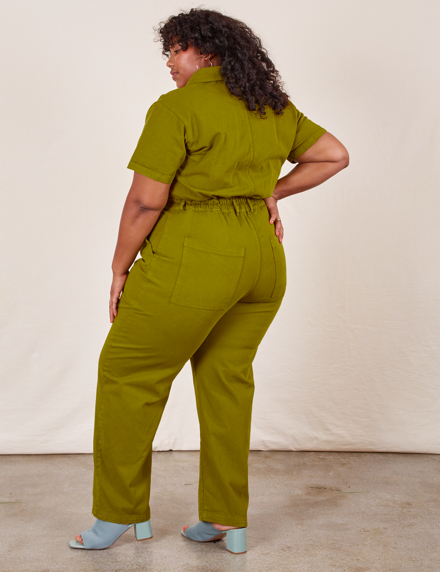 Back view of Short Sleeve Jumpsuit in Olive Green worn by Morgan