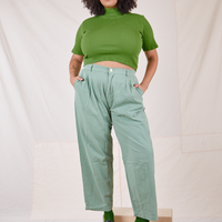 1/2 Sleeve Essential Turtleneck in Bright Olive on Lana wearing Sage Green Trousers