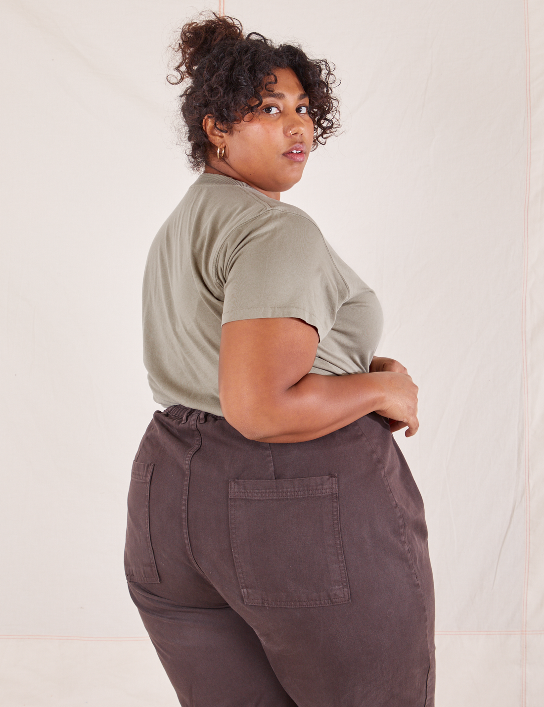 The Organic Vintage Tee in Khaki Grey side view on Morgan wearing espresso brown Western Pants