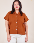 Faye is wearing Pantry Button-Up in Burnt Terracotta