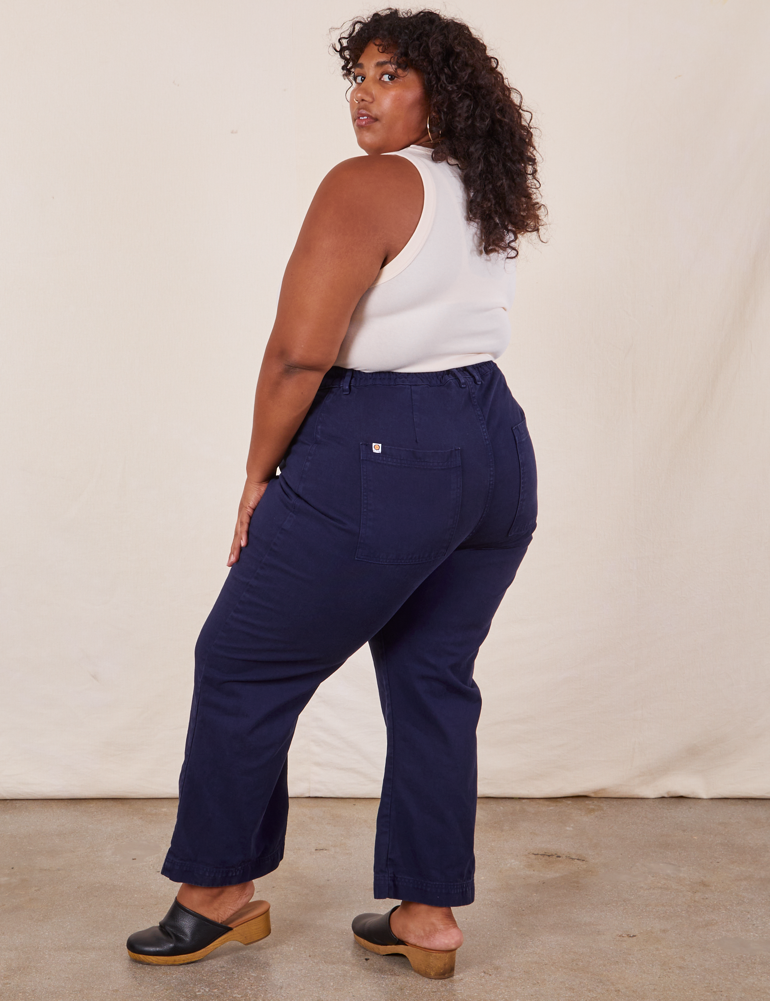 Angled back view of Western Pants in Navy Blue on Morgan