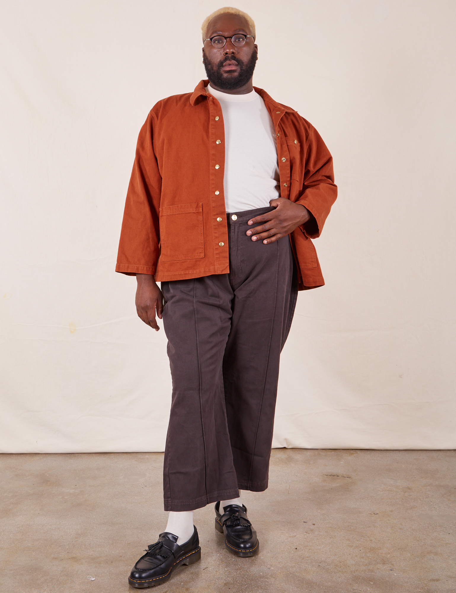 Denim Work Jacket in Burnt Terracotta on Elijah wearing vintage off-white Organic Tee and espresso brown Western Pants