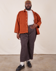 Denim Work Jacket in Burnt Terracotta on Elijah wearing vintage off-white Organic Tee and espresso brown Western Pants