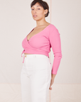 Wrap Top in Bubblegum Pink side view on Tiara wearing vintage off-white Western Pants