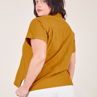 Pantry Button-Up in Spicy Mustard back view on Faye wearing vintage off-white Western Pants