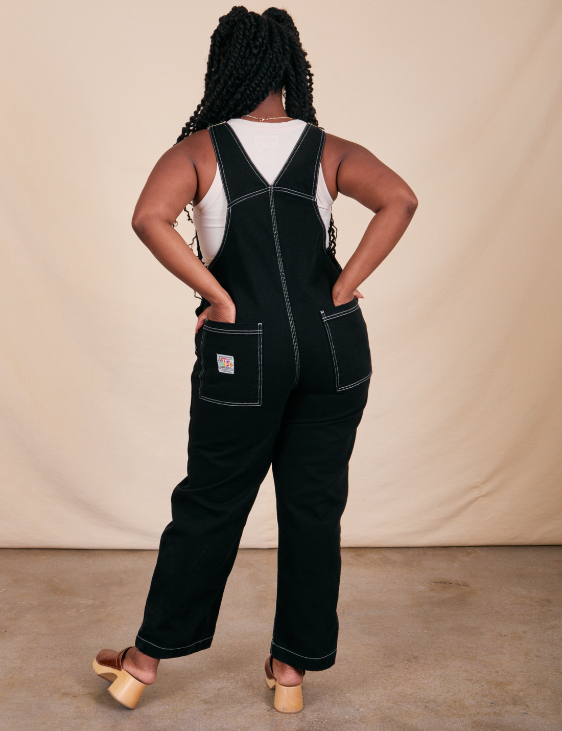 Back view of Original Overalls in Basic Black worn by Shai