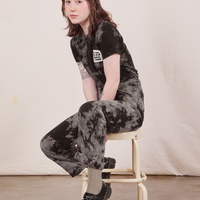 Hana is wearing Black Magic Waters Tee paired with matching Work Pants