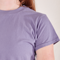 The Organic Vintage Tee in Faded Grape sleeve close up on Alex