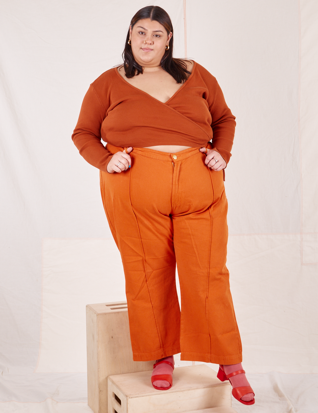 Wrap Top in Burnt Terracotta on Sarita wearing burnt orange Western Pants