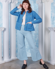 Neoclassical Work Jacket in Blue Venus on Alex wearing vintage off white Tank Top and baby blue Bell Bottoms