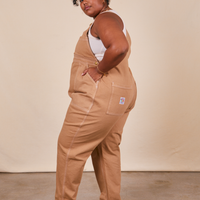 Side view of Original Overalls in Tan worn by Morgan