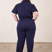 Back view of Short Sleeve Jumpsuit in Navy Blue worn by Ashley