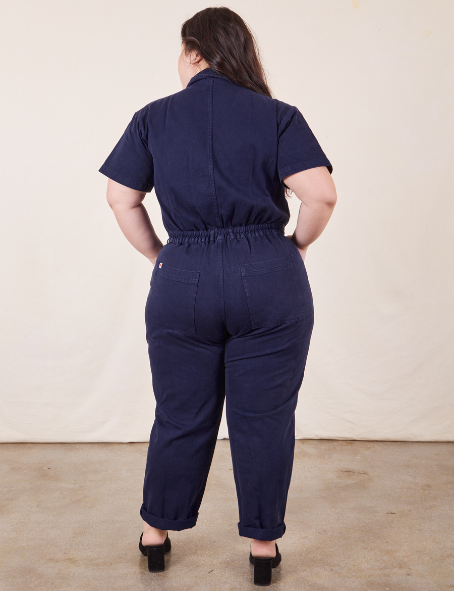 Back view of Short Sleeve Jumpsuit in Navy Blue worn by Ashley