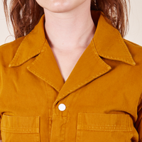 Short Sleeve Jumpsuit in Spicy Mustard front close up on Alex