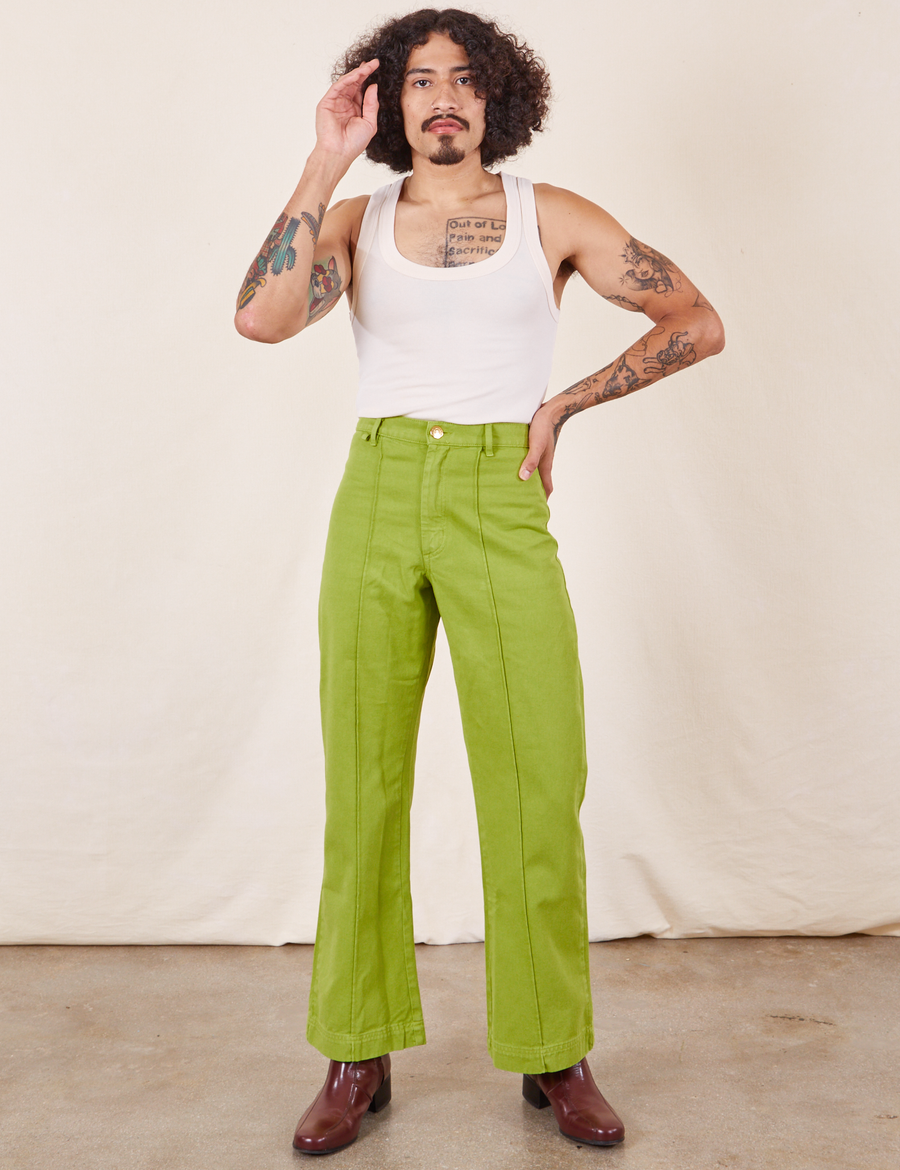 Western Pants in Gross Green on Jesse wearing vintage off-white Tank Top