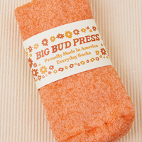 Thick Crew Sock in Orange Sherbert with packaging
