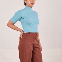 1/2 Sleeve Essential Turtleneck in Baby Blue on Mika wearing fudgesicle brown Bell Bottoms