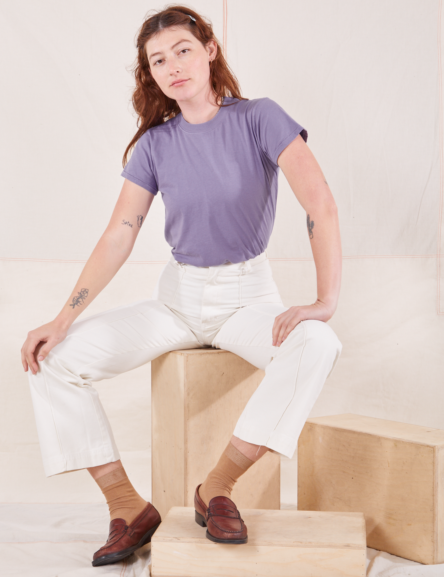 Alex is wearing Organic Vintage Tee in Faded Grape and vintage off-white Western Pants