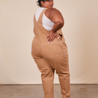 Back view of Original Overalls in Tan worn by Morgan