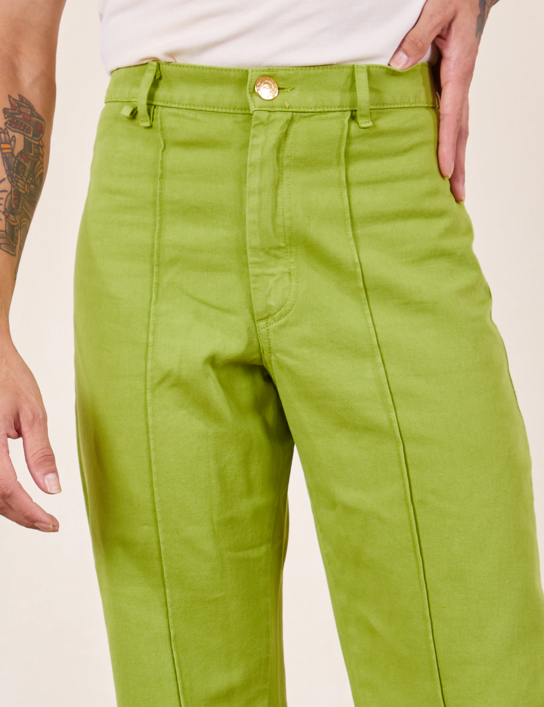 Western Pants in Gross Green front close up on Jesse