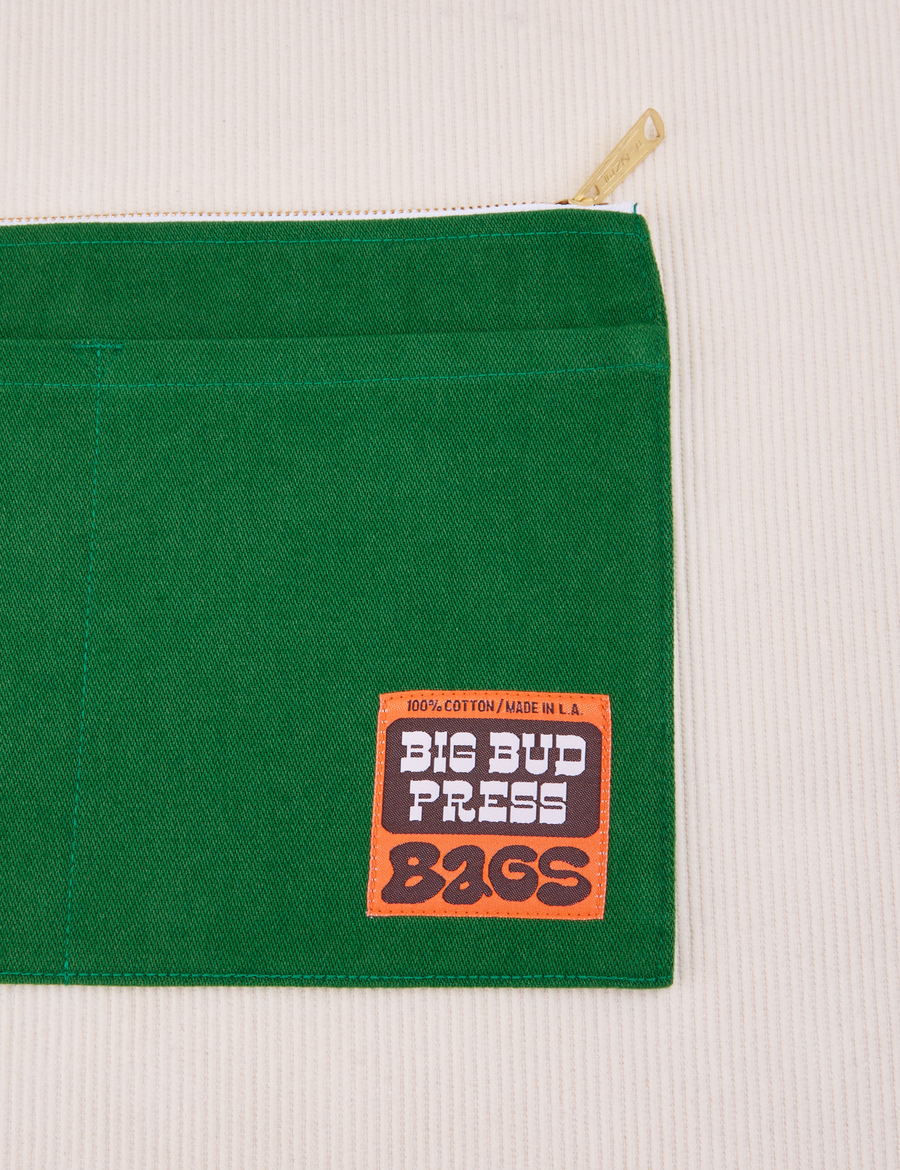 Big Pouch in Forest Green with Big Bud Press label in brown and orange