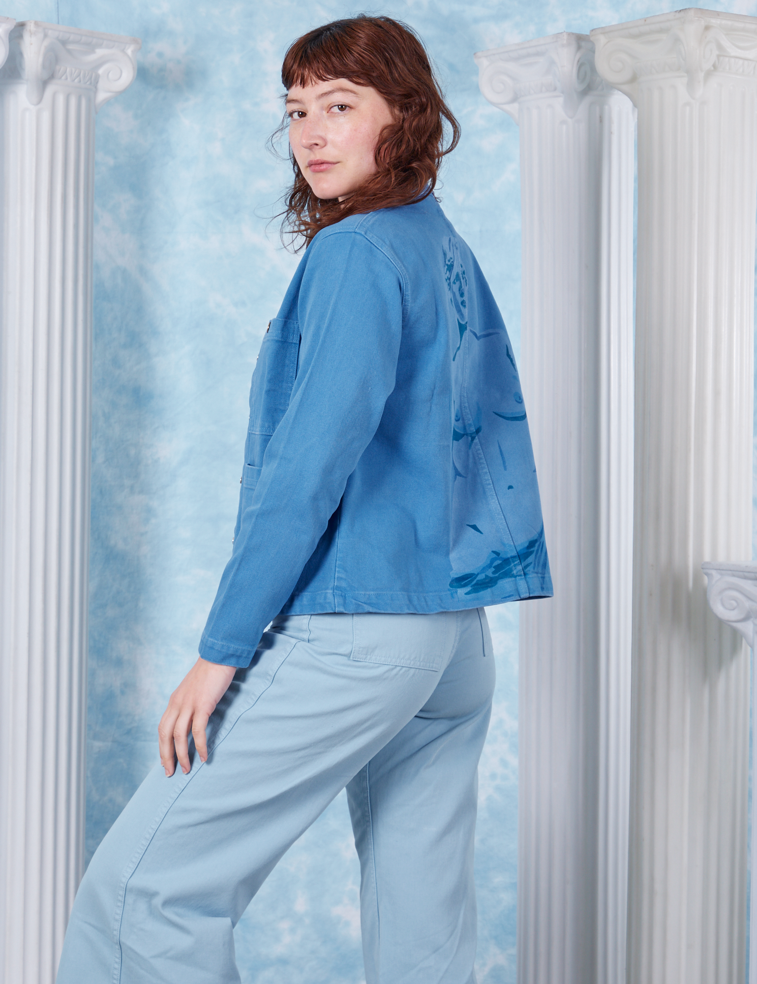 Neoclassical Work Jacket in Blue Venus side view on Alex wearing baby blue Bell Bottoms