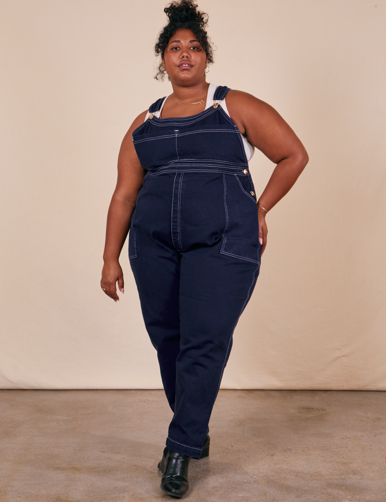Morgan is 5&#39;5&quot; and wearing 1XL Original Overalls in Navy Blue