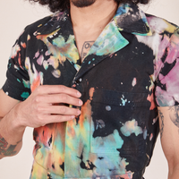 Short Sleeve Jumpsuit in Rainbow Magic Waters front close up on Jesse