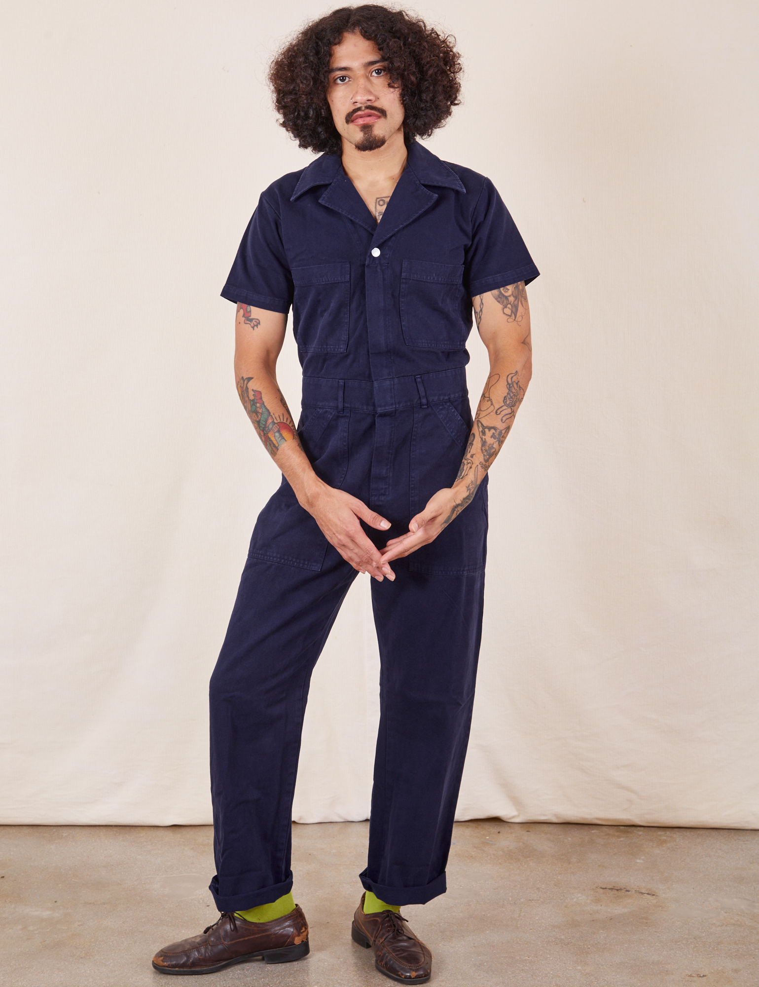 Jesse is 5&#39;8&quot; and wearing S Short Sleeve Jumpsuit in Navy Blue