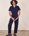 Jesse is 5'8" and wearing S Short Sleeve Jumpsuit in Navy Blue