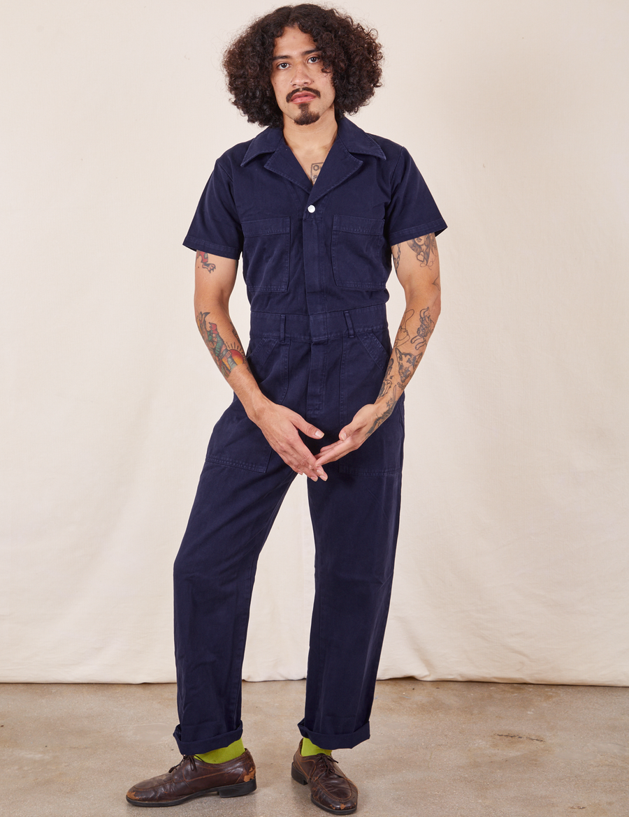 Jesse is 5'8" and wearing S Short Sleeve Jumpsuit in Navy Blue