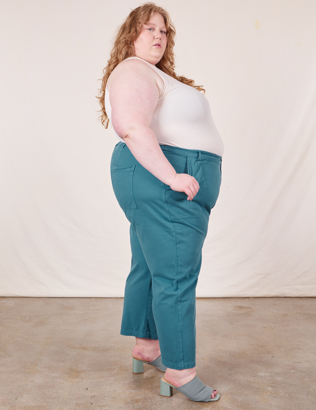 Work Pants in Marine Blue side view on Catie wearing vintage off-white Tank Top