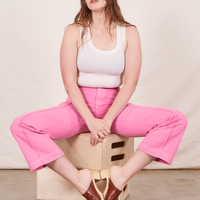 Western Pants in Bubblegum Pink on Allison wearing vintage off-white Tank Top sitting on wooden crate