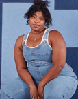 Indigo Denim Original Overalls in Light Wash on Morgan wearing vintage off-white Tank Top