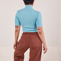 1/2 Sleeve Essential Turtleneck in Baby Blue back view on Mika wearing fudgesicle brown Bell Bottoms