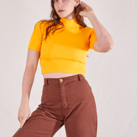 1/2 Sleeve Essential Turtleneck in Sunshine Yellow on Allison wearing fudgesicle brown Bell Bottoms
