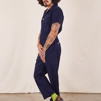 Side view of Short Sleeve Jumpsuit in Navy Blue worn by Jesse