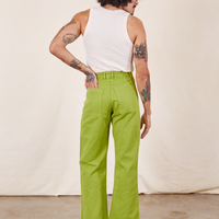 Western Pants in Gross Green back view on Jesse wearing vintage off-white Tank Top