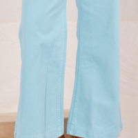 Pant leg close up of Bell Bottoms in Baby Blue worn by Hana