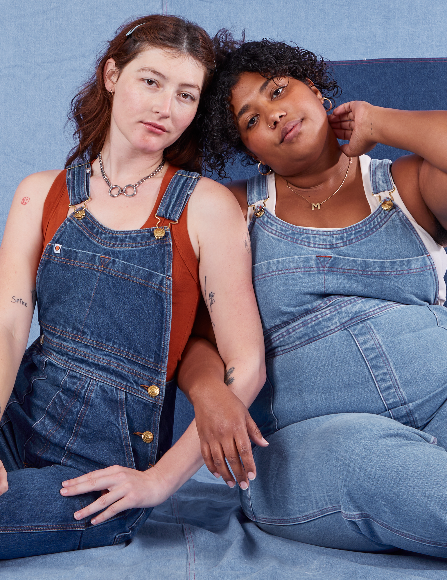 Indigo Denim Original Overalls in Light Wash on Morgan and dark wash on Alex