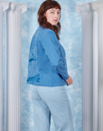 Neoclassical Work Jacket in Blue Venus side view on Alex wearing baby blue Bell Bottoms