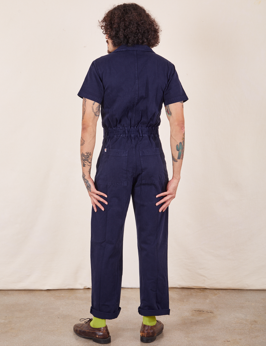 Back view of Short Sleeve Jumpsuit in Navy Blue worn by Jesse