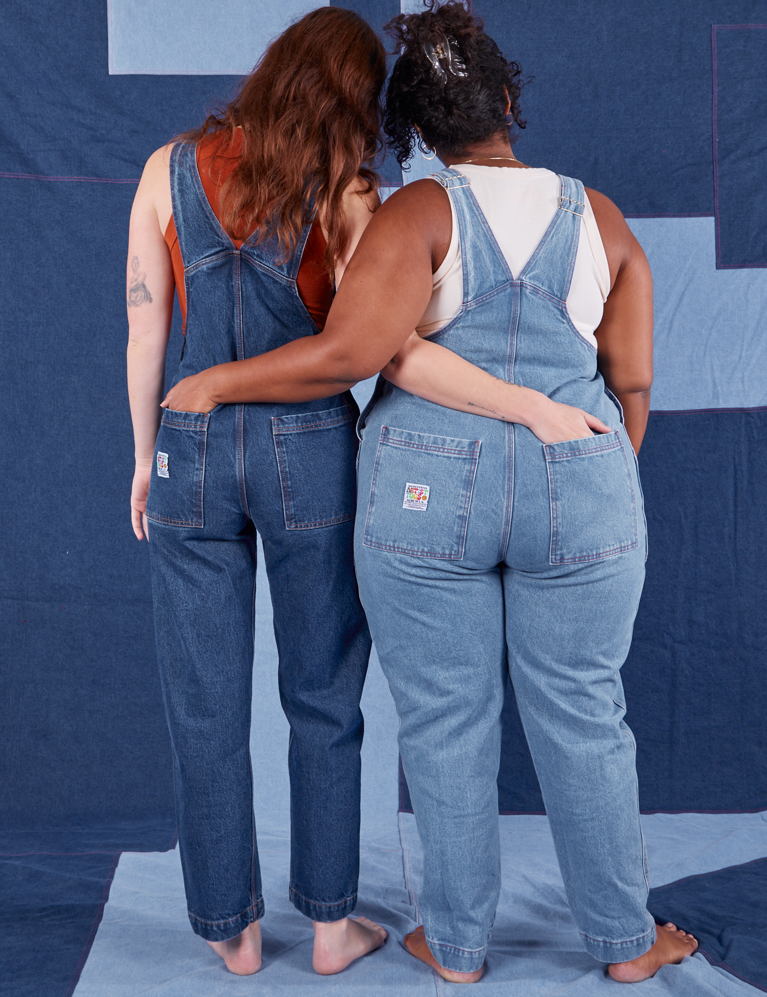 Indigo Denim Original Overalls in Light Wash back view on Morgan and dark wash on Alex