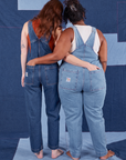 Indigo Denim Original Overalls in Light Wash back view on Morgan and dark wash on Alex