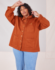 Morgan is wearing a buttoned up Denim Work Jacket in Burnt Terracotta