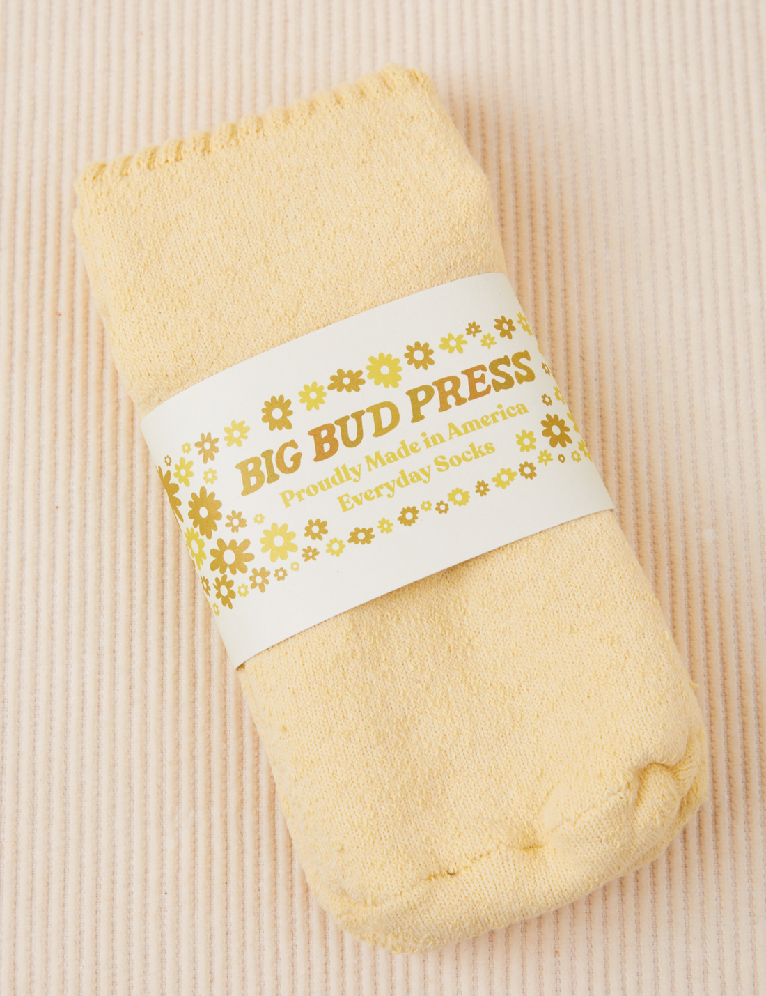Thick Crew Sock in Butter Yellow with packaging
