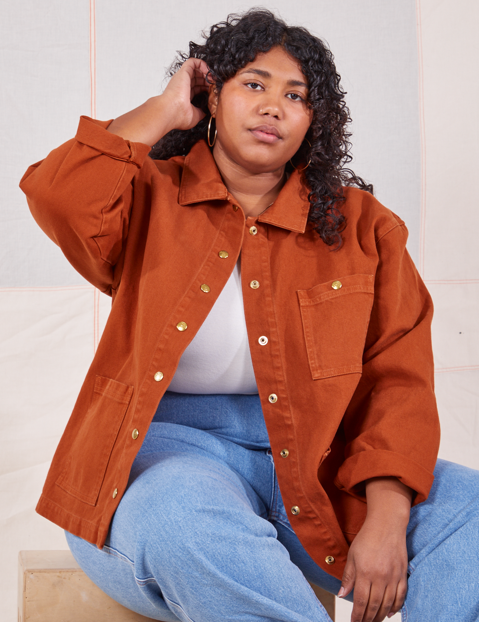 Morgan is wearing Denim Work Jacket in Burnt Terracotta