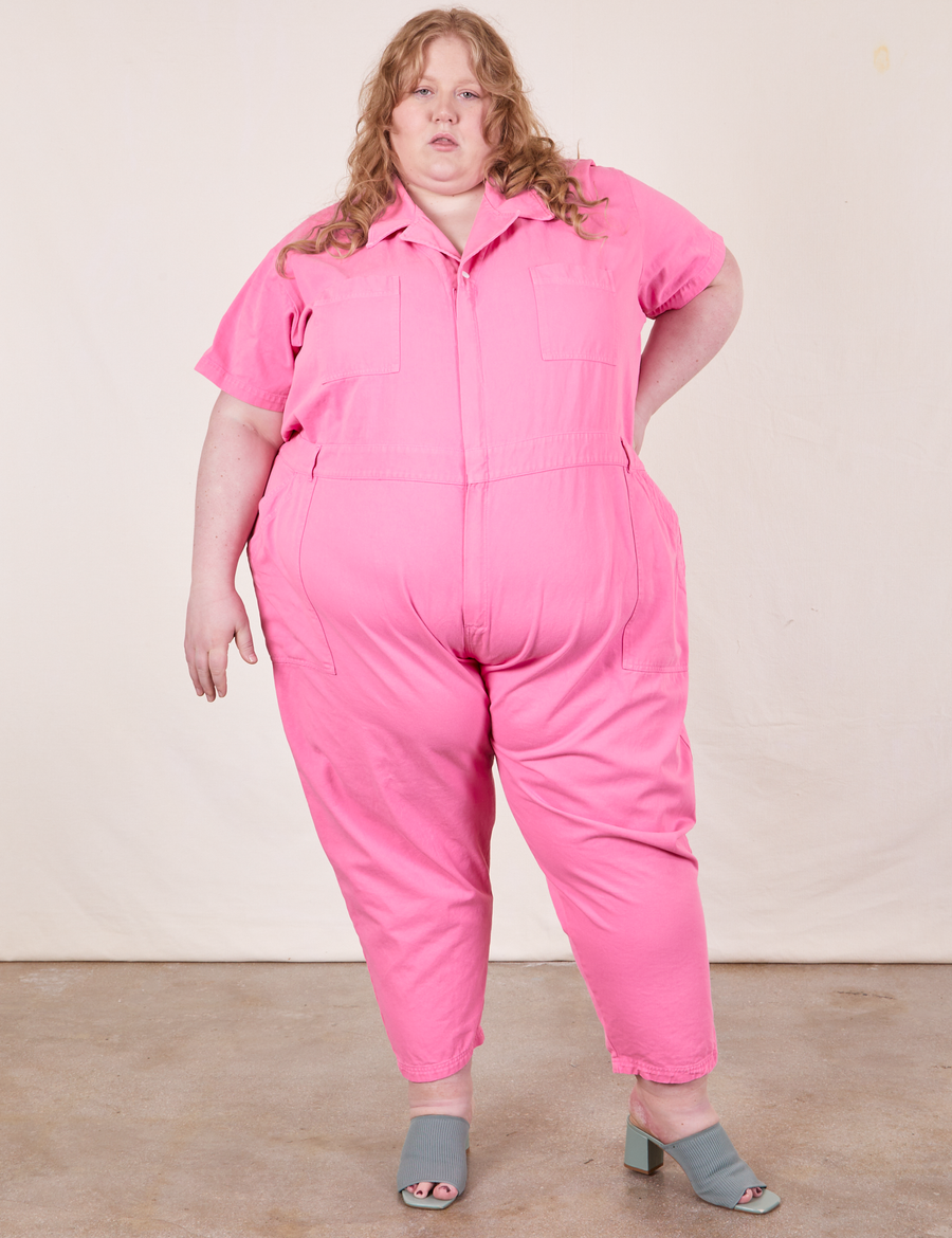 Catie is 5'11" and wearing size 5XL Short Sleeve Jumpsuit in Bubblegum Pink
