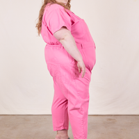 Short Sleeve Jumpsuit in Bubblegum Pink side view on Catie
